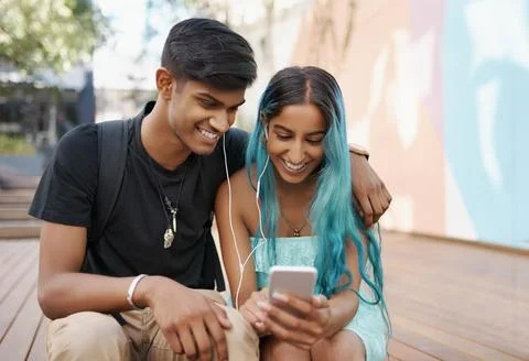 Taking a break from studying to listen to some music Stock Photos