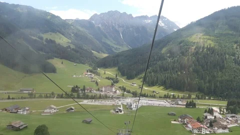 Taking cable car up to Isskogel mountain peak at village Gerlos Austria Video stock 119314292