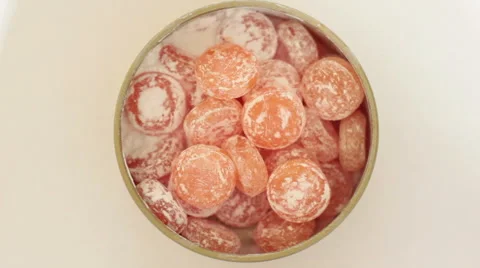 Taking a candy  from tin can. Stock Footage 55714821
