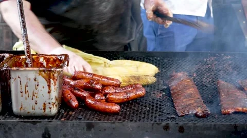 Taking care of the BBQ Stock Footage 138132895