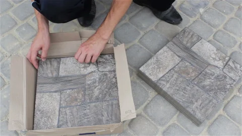 A taking ceramic tiles of the box Stock Footage 91929091