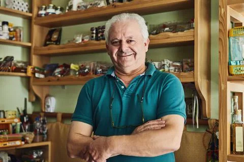 Taking on the challenge of starting a small business. Shot of a senior man Stock Photos