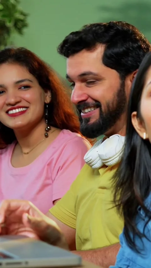 Taking cheerful selfie, college students study complete assignment using laptop Stock Footage 342385042