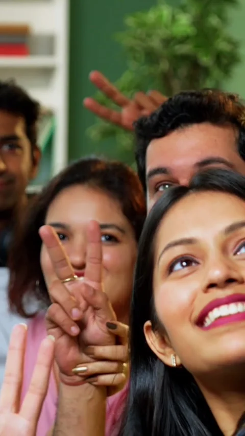 Taking cheerful selfie, college students study complete assignment using laptop Stock Footage 342385048