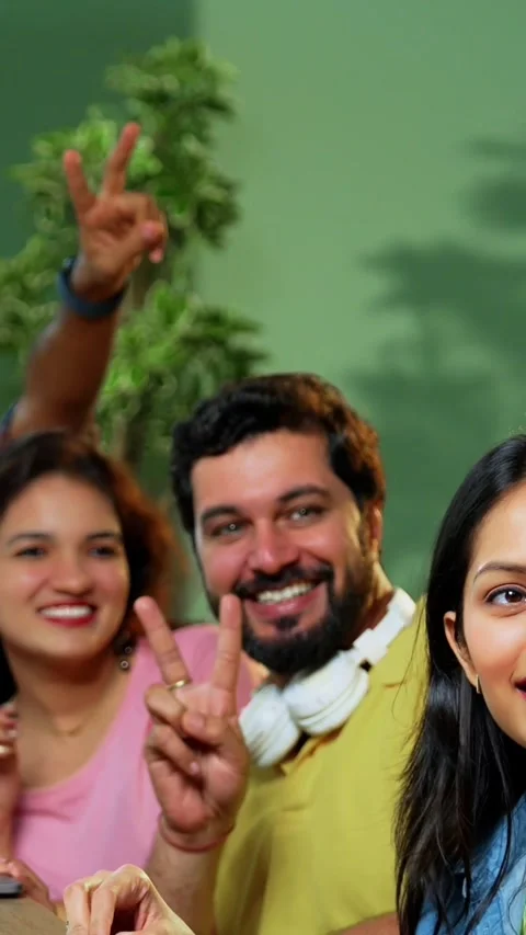 Taking cheerful selfie, college students study complete assignment using laptop Stock Footage 342385052