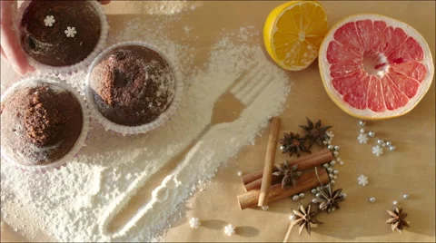 Taking Chocolate Muffins Out the Table Stock Footage 61924785