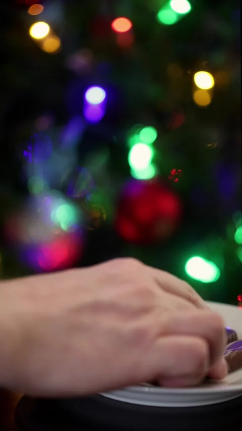 Taking Christmas Cookie - slow - vertical Stock Footage 323246551