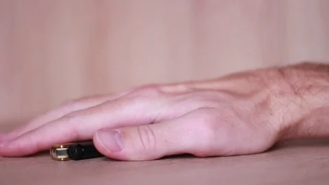 Taking cigarette and lighter by tremored hand 스톡 동영상 81857290
