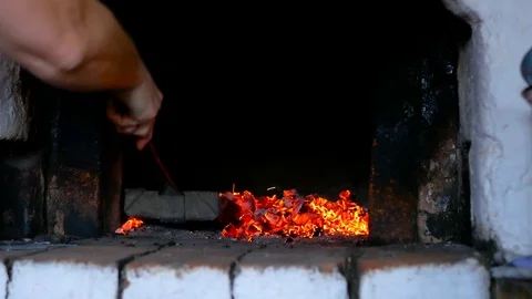 Taking coals in the russian stove 動画素材 85681429