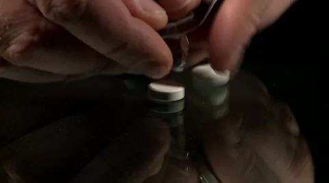 Taking couple of pills from package Vídeo Stock 2849211