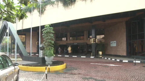 Taking Cover From Rain Under a Building Vidéo 57222488