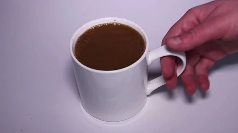 Taking A Cup Of Coffee With Milk Stock Footage 87503278