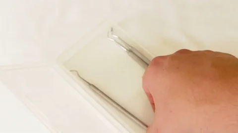 Taking dental tools Stock Footage 78532953