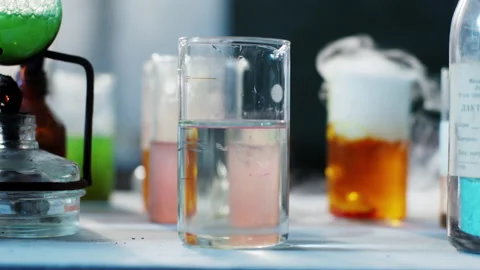 Taking details in front of the camera experiment in the chemistry laboratory of Stock Footage 153091903