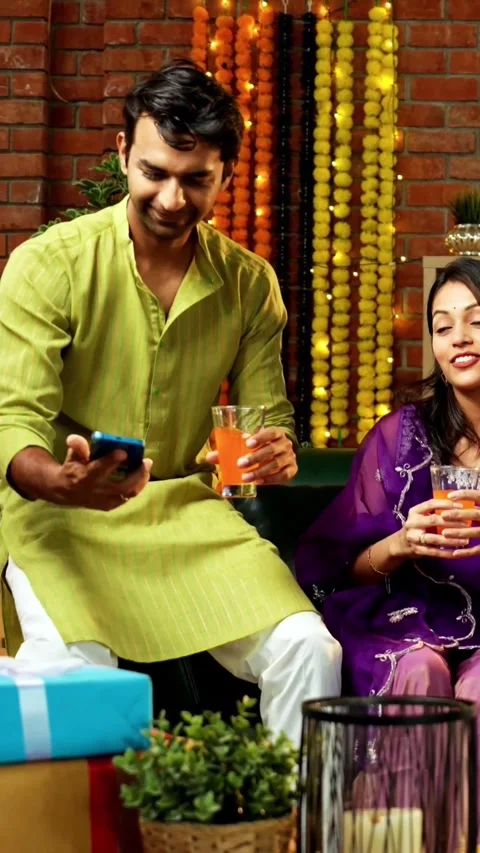 Taking Diwali selfie while enjoying cold drink with Indian couple and friends Stock-Footage 342384928