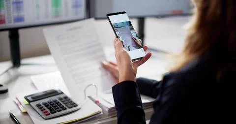 Taking Document Paper Photo Using Smartphone Scanner App Foto stock