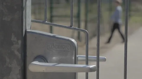 Taking Dog Behind the Fence Stock Footage 31818905