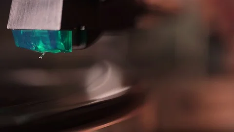 Taking down tonearm of a vinyl turntable 4k Stock Footage 97375952