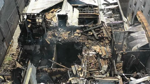 Taking the drone of the day after the fire that consumed the Pedro de Valdivi Stock Footage 136345731