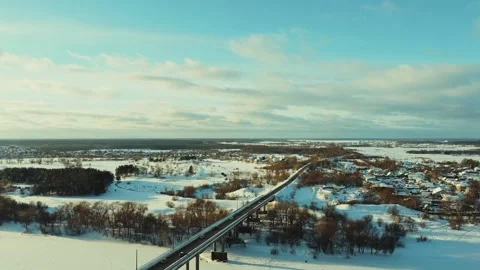 Taking off on a drone over a bridge in winter Video stock 168925814
