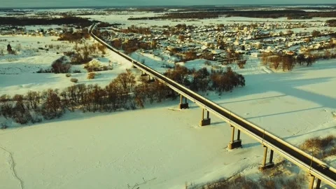 Taking off on a drone over a bridge in winter Video stock 168925852