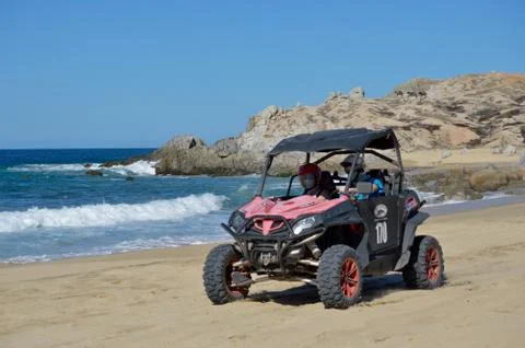 Taking a Dune Buggy Off-Roading  at the beach 스톡 사진