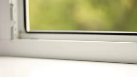 Taking the electronic book and putting it back 動画素材 79786167