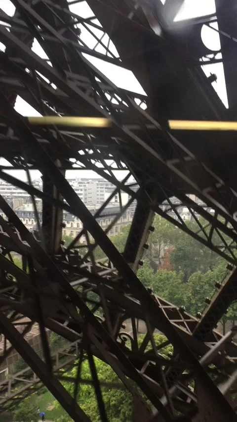 Taking an Elevator to the Top of the Eiffel Tower. Structure Patterns. Stock-Footage 141073056