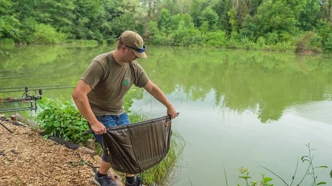Taking an empty net out of the water Stock Footage 112173992
