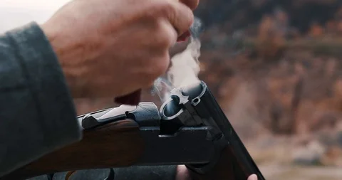 Taking empty shells out of shotgun Stock-Footage 127464827