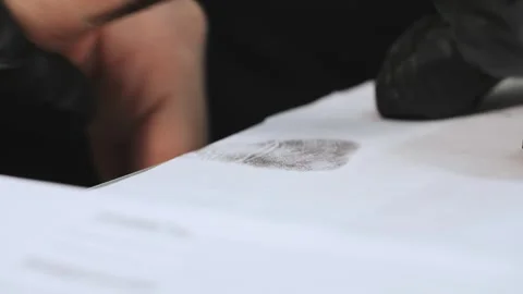 Taking fingerprints from a womans hand. Stock Footage 316727235