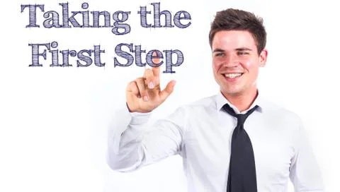 Taking the First Step - Young smiling businessman touching text Stock Photos