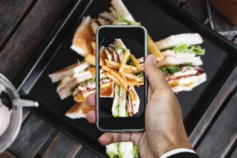 Taking food photo, food photography by smart phone, club sandwich Stock Photos