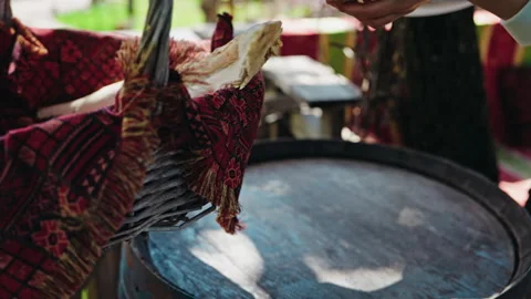 Taking Fresh Vegetables From A Basket Onto A Wine Barrel Stock Footage 345437429