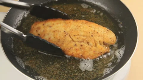 Taking Fried Fish From Hot Pan Stock Footage 61201302