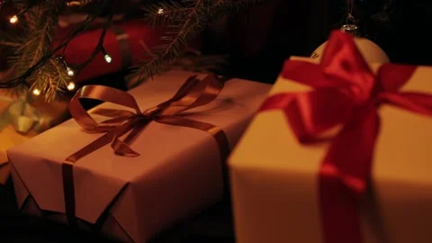 Taking  gift under christmas tree. Beautiful presents under the Christmas  Video stock 142138776