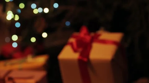 Taking  gift under christmas tree. Beautiful presents under the Christmas  Video stock 142138808