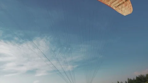 Taking off from the ground and hovering on the parachute in the Russian village Video stock 102830867
