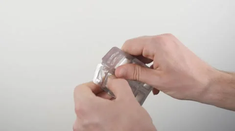 Taking Gum Out of Package in 4K Vidéo 53201488