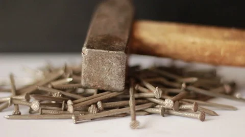 Taking hammer from the pile of nails Vídeo Stock 75827283