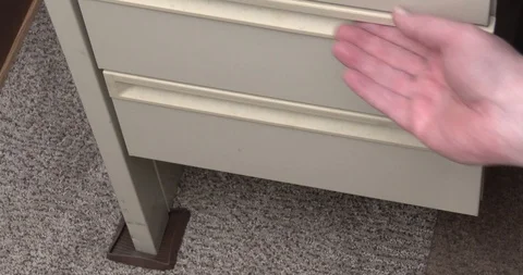 Taking Hand Gun from Drawer - Racking or Cocking Gun - Office 库存影片 127514236