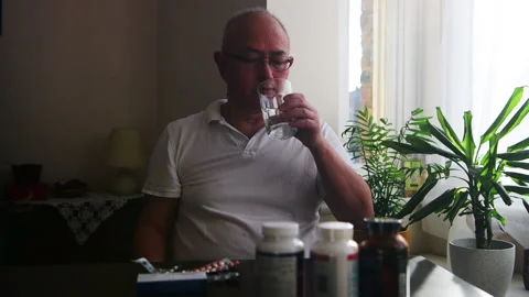 Taking health supplements. Stock Footage 171037270