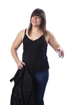 Taking off her jacket Stock-Fotos