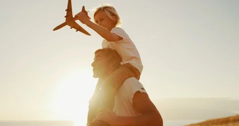 Taking his son into the endless sky Stock Footage 101397565