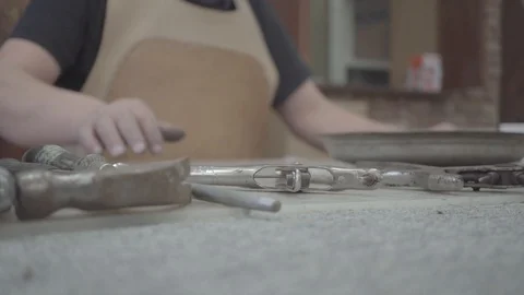 Taking Hole Punch slow motion Stock Footage 125889256