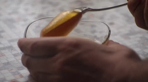 Taking honey spoon Video stock 34547422