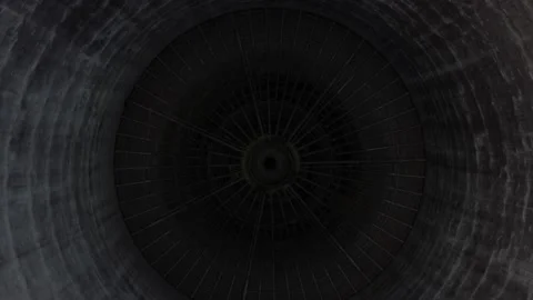 Taking off inside a factory chimney Stock Footage 156416273