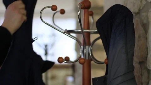 Taking a jacket from a hanger 動画素材 71952378
