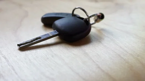 Taking Keys to Desk and Taking them from Desk . Arriving / Leaving Home concept Stock Footage 50516824