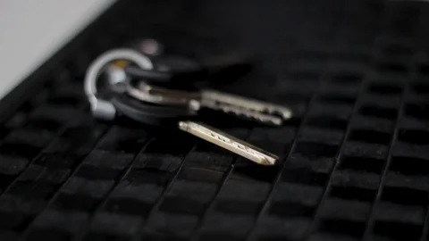 Taking Keys From the Table Stock Footage 80610466